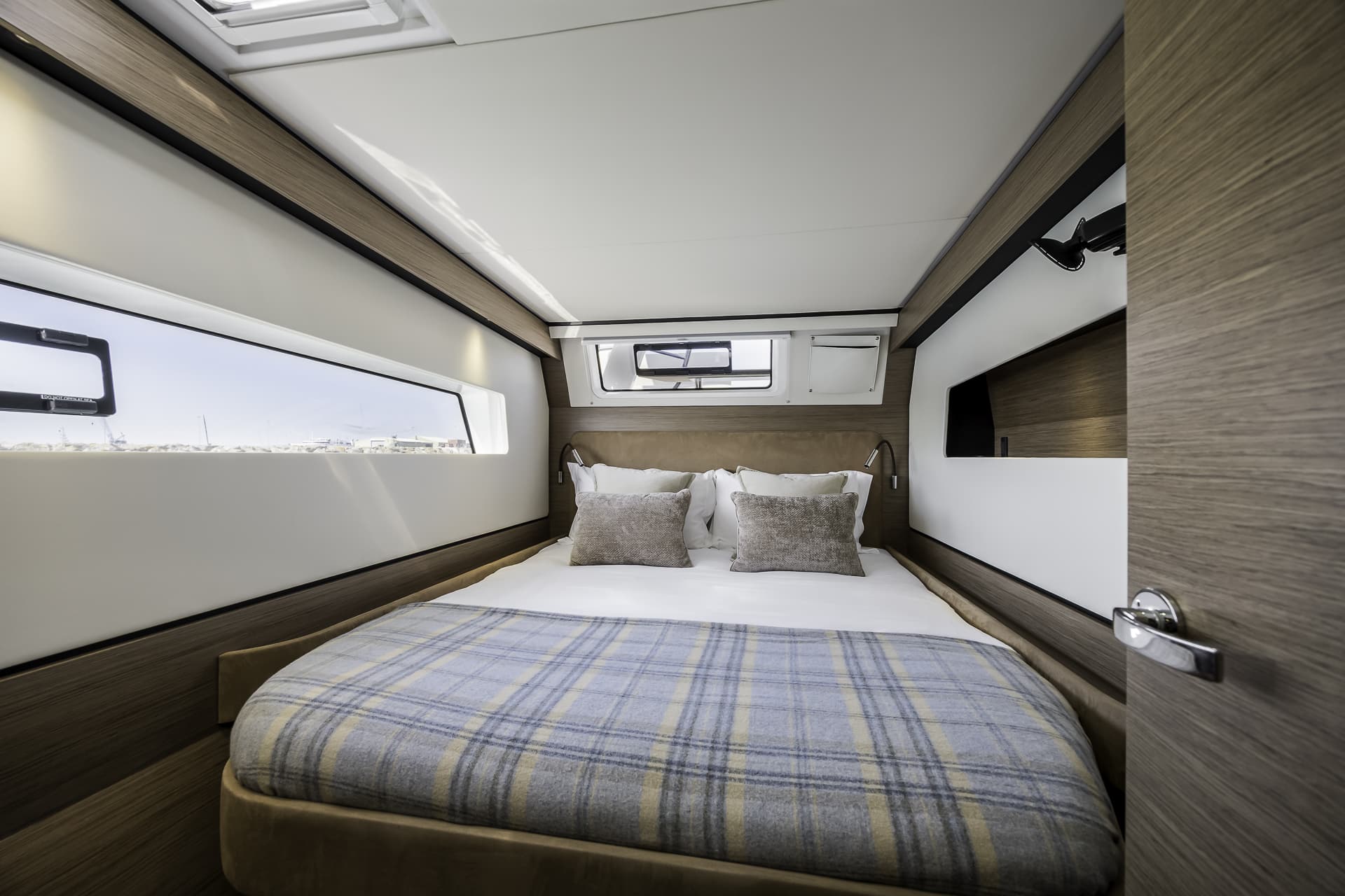Second guest double cabin aboard the Seven Days catamaran, providing luxury accommodation for private yacht charters from Poole Harbour.