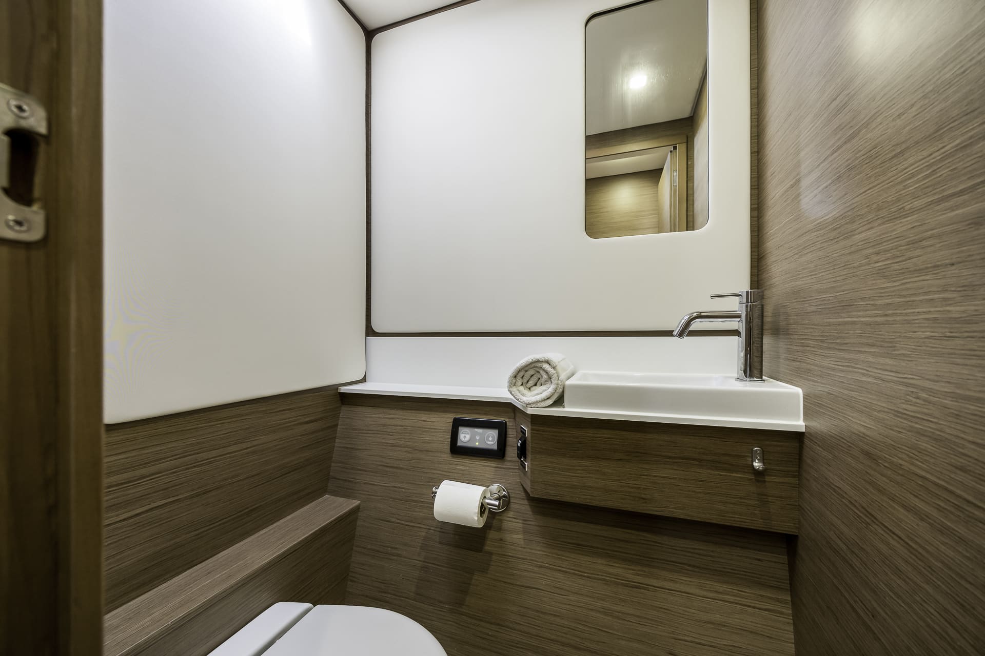 Private onboard toilet facilities within the guest accommodation of the Seven Days catamaran.